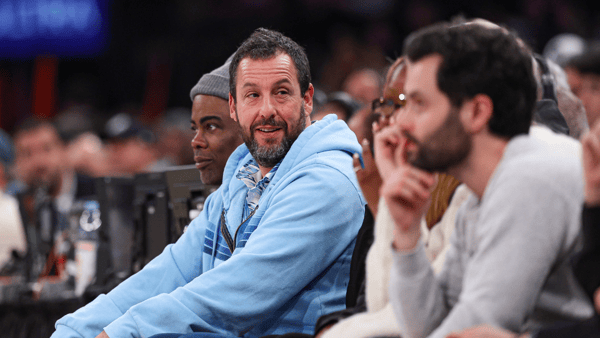 Jan 20, 2025; New York, New York, USA; Actor and comedian Adam Sandler looks on during the first half of the NBA game between the New York Knicks and the Atlanta Hawks at Madison Square Garden. Mandatory Credit: Vincent Carchietta-Imagn Images