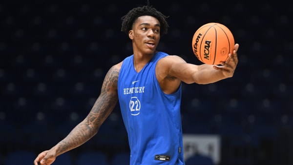 Mar 27, 2025; Indianapolis, IN, USA; Kentucky Wildcats center Amari Williams (22) stretches during the NCAA tournament midwest regional practice day at Lucas Oil Stadium. Mandatory Credit: Robert Goddin-Imagn Images