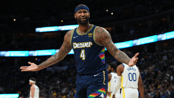 Apr 24, 2022; Denver, Colorado, USA; Denver Nuggets center DeMarcus Cousins (4) reacts to a foul in the second quarter against the Golden State Warriors of the first round for the 2022 NBA playoffs at Ball Arena. Mandatory Credit: Ron Chenoy-Imagn Images