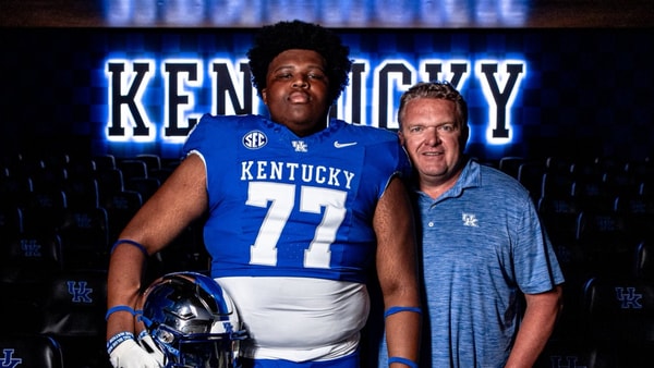 Photo of Cameron Miller (left) and Eric Wolford via UK Athletics