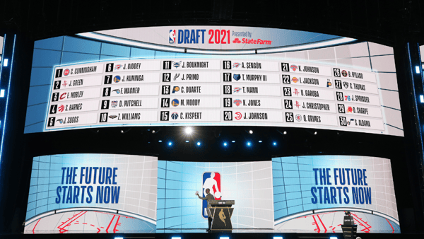 Adam Silver on the stage at the NBA Draft, via Brad Penner-Imagn Images
