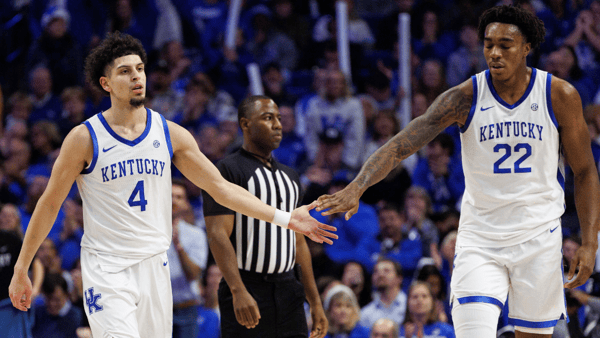 Dec 11, 2024; Lexington, Kentucky, USA; Kentucky Wildcats center Amari Williams (22) fives guard Koby Brea (4) during the second half against the Colgate Raiders at Rupp Arena at Central Bank Center. Mandatory Credit: Jordan Prather-Imagn Images
