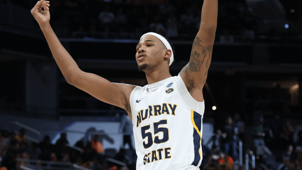 Mar 19, 2022; Indianapolis, IN, USA; Murray State Racers forward DJ Burns (55) celebrates a play in the first half against the St. Peter's Peacocks during the second round of the 2022 NCAA Tournament at Gainbridge Fieldhouse. Mandatory Credit: Trevor Ruszkowski-Imagn Images