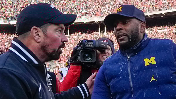Ohio State Buckeyes head coach Ryan Day shakes hands with Michigan Wolverines head coach Sherrone Moore following another OSU loss to Michigan at Ohio Stadium in Columbus on Saturday, Nov. 30, 2024. Michigan won 13-10. © Adam Cairns/Columbus Dispatch / USA TODAY NETWORK via Imagn Images