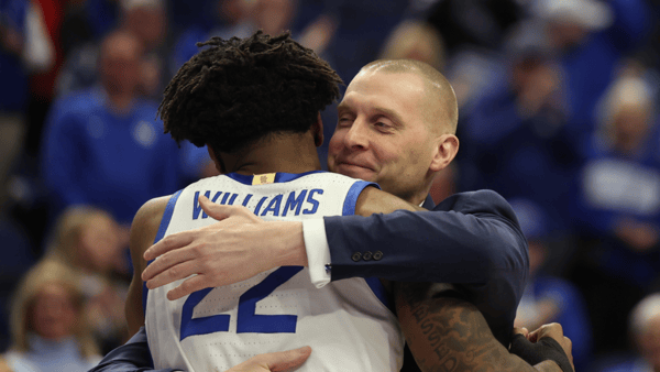 Mark Pope embraces Amari Williams on Senior Night at Rupp Arena - Photo by Dr. Michael Huang, Kentucky Sports Radio