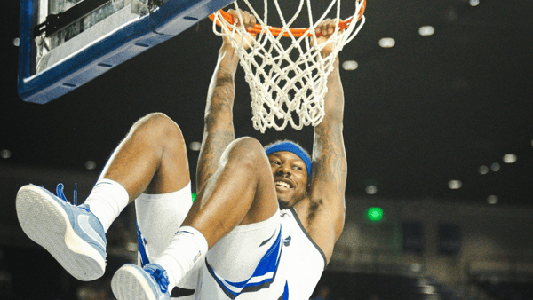 Archie Goodwin hangs on the rim in a La Familia win, via Aaron Perkins, KSR