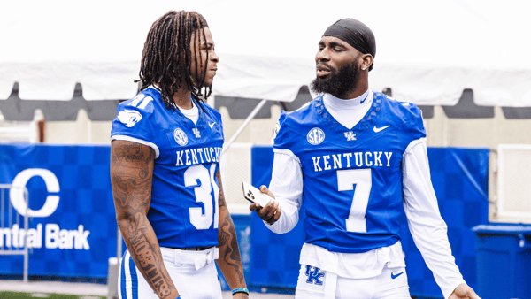 Kentucky LBs Quintavion Norman (left) and Daveren Rayner chat at UK Football Media Day, via Aaron Perkins, KSR