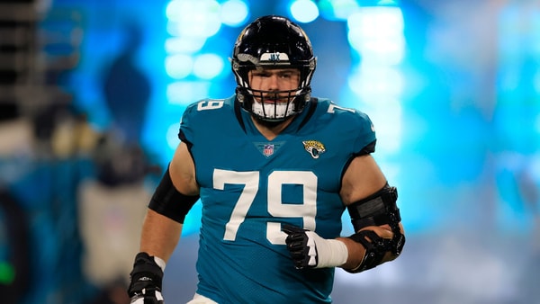Jacksonville Jaguars center Luke Fortner (79) runs onto the field before an NFL first round playoff football matchup Saturday, Jan. 14, 2023 at TIAA Bank Field in Jacksonville, Fla. The Jacksonville Jaguars edged the Los Angeles Chargers on a field goal 31-30. [Corey Perrine/Florida Times-Union]