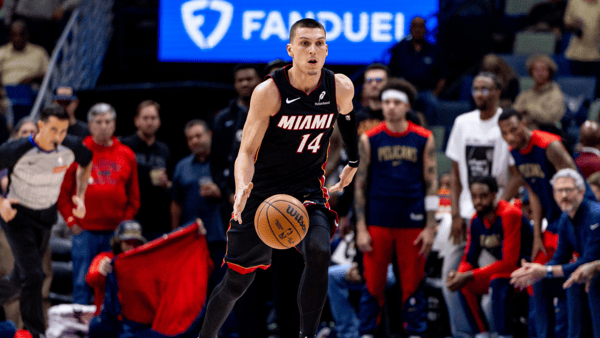 Apr 11, 2025; New Orleans, Louisiana, USA; Miami Heat guard Tyler Herro (14) brings the ball up court against the New Orleans Pelicans during the first half at Smoothie King Center. Mandatory Credit: Stephen Lew-Imagn Images