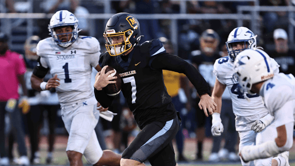 Moeller QB Matt Ponatoski (7) runs the ball during their football game against St. Xavier Friday, Sept. 19, 2025. (© Tony Tribble for The Enquirer / USA TODAY NETWORK via Imagn Images)