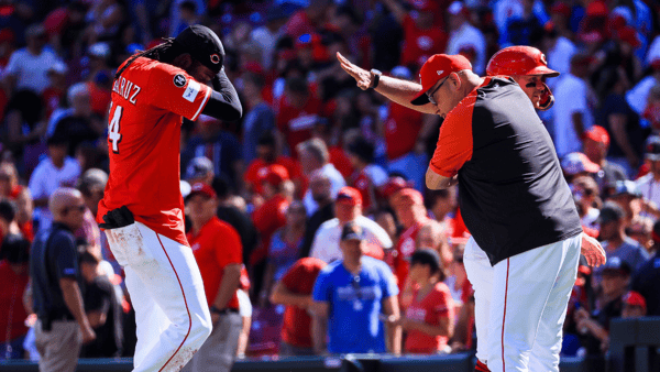Sep 1, 2025; Cincinnati, Ohio, USA; Cincinnati Reds shortstop Elly De La Cruz (44) reacts with manager Terry Francona (77) after the victory over the Toronto Blue Jays at Great American Ball Park. Mandatory Credit: Katie Stratman-Imagn Images