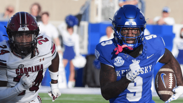 Kentucky’s Dane Key runs after he catches the ball against South Carolina’s Jalon Kilgore Saturday at Kroger Field in Lexington. Sept. 7, 2024. (© Scott Utterback/Courier Journal / USA TODAY NETWORK)