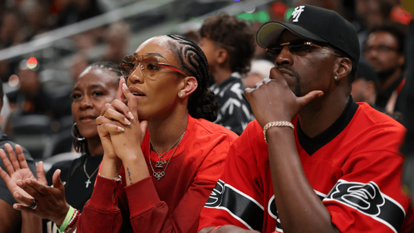 Jul 18, 2025; Indianapolis, IN, USA; Las Vegas Aces forward A’ja Wilson and boyfriend Miami Heat player Bam Adebayo watch the three-point contest during the 2025 WNBA All Star Skills Challenge at Gainbridge Fieldhouse. Mandatory Credit: Trevor Ruszkowski-Imagn Images