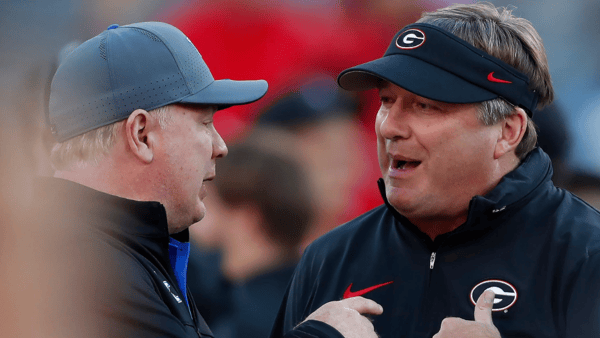 Georgia head coach Kirby Smart with Kentucky's Mark Stoops, via Joshua L. Jones : USA TODAY NETWORK