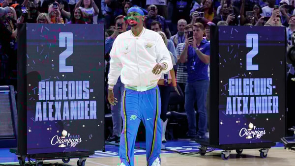 Oct 21, 2025; Oklahoma City, Oklahoma, USA; Oklahoma City Thunder guard Shai Gilgeous-Alexander walks onto the court during the championship ring and banner ceremony before the start of their game against the Houston Rockets at Paycom Center. Mandatory Credit: Alonzo Adams-Imagn Images