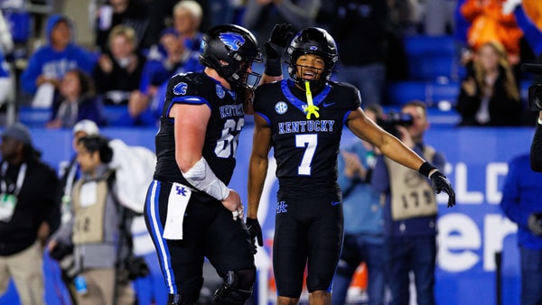 Oct 25, 2025; Lexington, Kentucky, USA; Kentucky Wildcats offensive lineman Jager Burton (62) celebrates with wide receiver DJ Miller (7) after Miller scores a touchdown during the third quarter against the Tennessee Volunteers at Kroger Field. Mandatory Credit: Jordan Prather-Imagn Images