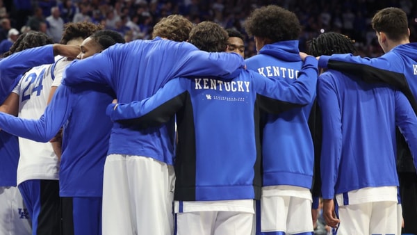 The Kentucky basketball team huddles at Rupp Arena, via Dr. Michael Huang, KSR