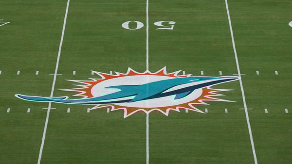 Oct 30, 2025; Miami Gardens, Florida, USA; The Miami Dolphins logo is seen at midfield prior to a game against the Baltimore Ravens at Hard Rock Stadium. Mandatory Credit: Nathan Ray Seebeck-Imagn Images