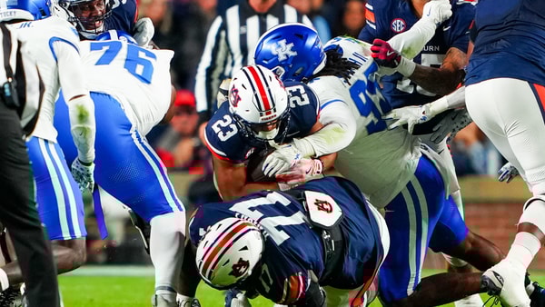 Kentucky Wildcats quarterback Cutter Boley (8) hugs teammates before Auburn Tigers take on Kentucky Wildcats in Auburn, Ala. on Saturday, Nov. 1, 2025. (© Jake Crandall/ Advertiser / USA TODAY NETWORK via Imagn Images)