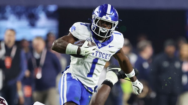 Nov 1, 2025; Auburn, Alabama, USA; Kentucky Wildcats wide receiver Kendrick Law (1) escapes the tackle of Auburn Tigers linebacker Bryce Deas (16) during the fourth quarter at Jordan-Hare Stadium. Mandatory Credit: John Reed-Imagn Images