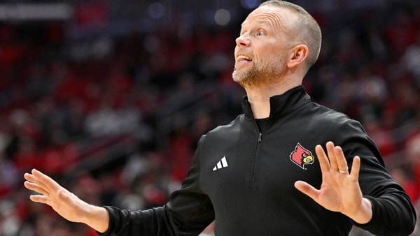 Nov 3, 2025; Louisville, Kentucky, USA; Louisville Cardinals head coach Pat Kelsey calls out instructions during the first half against the South Carolina State Bulldogs at KFC Yum! Center. Mandatory Credit: Jamie Rhodes-Imagn Images