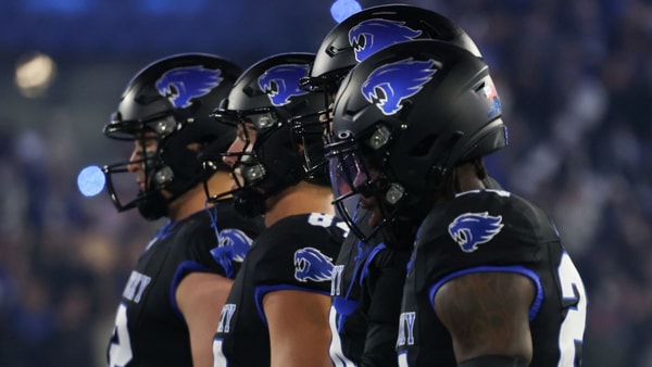 Kentucky players line up during a night game at Kroger Field on 10:25:2025 - Dr. Michael Huang, Kentucky Sports Radio:On3