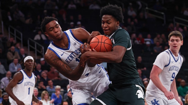 Nov 18, 2025; New York, New York, USA; Kentucky Wildcats forward Brandon Garrison (10) and Michigan State Spartans forward Cameron Ward (3) battle for a rebound during the first half at Madison Square Garden. Mandatory Credit: Vincent Carchietta-Imagn Images