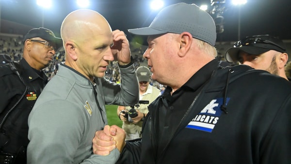 Clark Leak and Mark Stoops after the Kentucky loss to Vanderbilt, via Steve Roberts-Imagn Images
