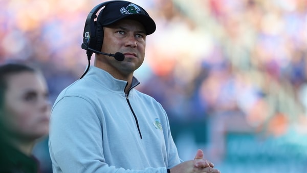 Dec 20, 2024; Tampa, FL, USA; Tulane Green Wave head coach Jon Sumrall looks on against the Florida Gators during the first quarter at Raymond James Stadium. Mandatory Credit: Kim Klement Neitzel-Imagn Images