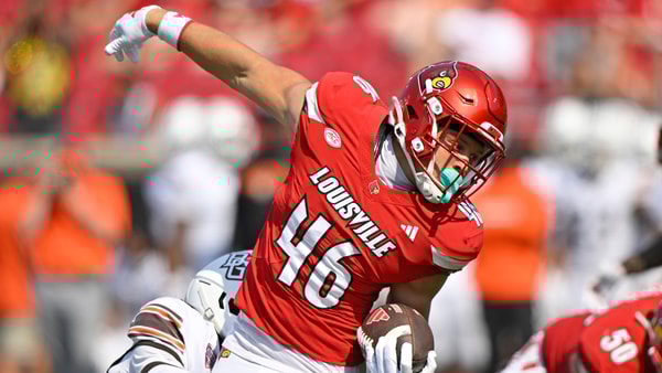 Sep 20, 2025; Louisville, Kentucky, USA; Louisville Cardinals running back Braxton Jennings (46) runs the ball against Bowling Green Falcons cornerback JoJo Johnson (10) during the second half at L&N Federal Credit Union Stadium. Louisville defeated Bowling Green 40-17. Mandatory Credit: Jamie Rhodes-Imagn Images