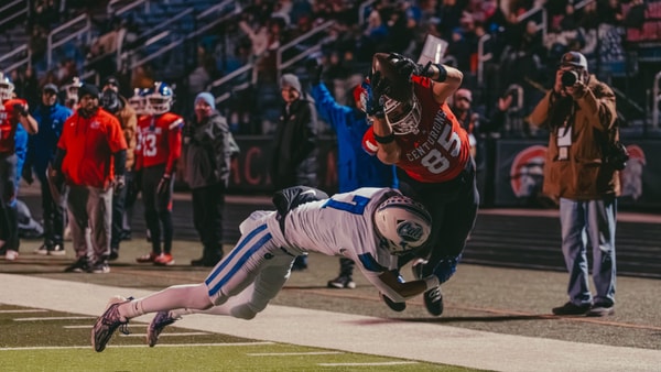 CAL's Micah Akin dives into the end zone | photo credit: Connor Ward