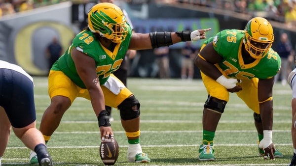 Oregon offensive linemen Iapani Laloulu, left, and Emmanuel Pregnon line up for the Ducks, via Ben Lonergan:The Register-Guard : USA TODAY NETWORK via Imagn Images