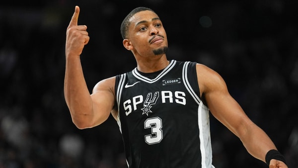 Nov 18, 2025; San Antonio, Texas, USA; San Antonio Spurs forward Keldon Johnson (3) celebrates in the second half against the Memphis Grizzlies at Frost Bank Center. Mandatory Credit: Daniel Dunn-Imagn Images