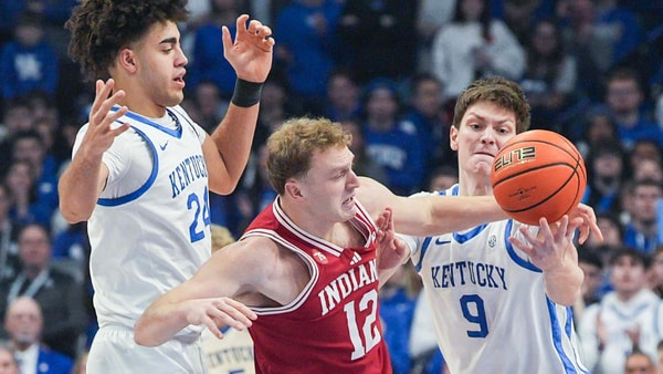 Kentucky Wildcats forward Trent Noah (9) pressures Indiana Hoosiers forward Tucker Devries (12) with Kentucky Wildcats center Malachi Moreno (24) in the first half. Kentucky beat the Hoosiers 72-60 during college basketball at Rupp Arena in Lexington, Kentucky December 13, 2025. Devries finished with 15 points - Matt Stone/Courier Journal / USA TODAY NETWORK via Imagn Images