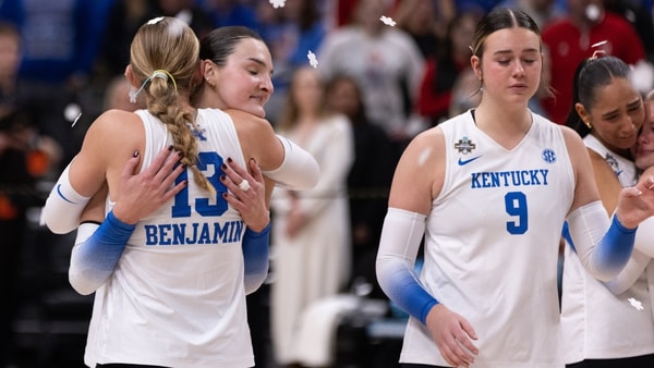 Dec 21, 2025; Kansas City, MO, USA; Kentucky Wildcats outside hitter Eva Hudson (7) and Kentucky Wildcats outside hitter Hannah Benjamin (13) hug following their loss to Texas A&M in the 2025 NCAA Women’s Volleyball Championship at T-Mobile Center.Mandatory Credit: Kylie Graham-Imagn Images