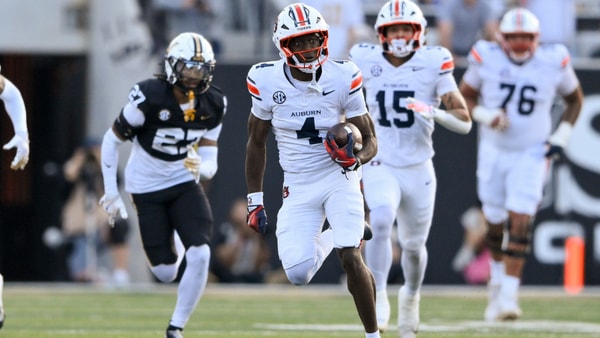 Nov 8, 2025; Nashville, Tennessee, USA; Auburn Tigers wide receiver Malcolm Simmons (4) runs with the ball after a made catch against the Vanderbilt Commodoresduring the first half at FirstBank Stadium. Mandatory Credit: Steve Roberts-Imagn Images