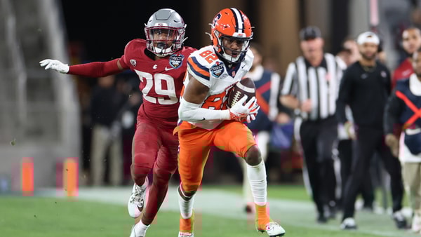 Dec 27, 2024; San Diego, CA, USA; Syracuse Orange wide receiver Darrell Gill Jr. (82) catches the ball against Washington State Cougars defensive back Jamorri Colson (29) during the second half at Snapdragon Stadium. Mandatory Credit: Abe Arredondo-Imagn Images