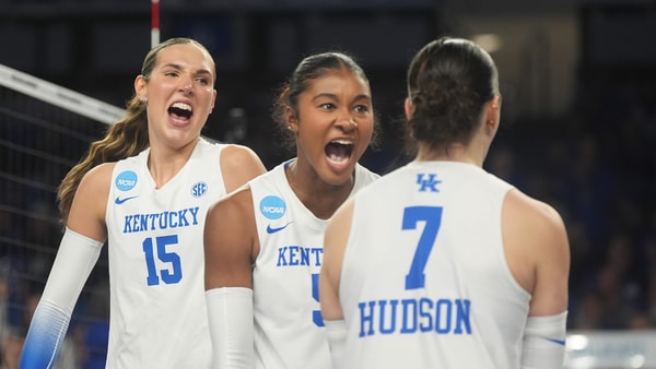 Kentucky's middle blocker Jordyn Dailey (5) celebrates with Eva Hudson (7) and Lizzie Carr (15) against Cal Poly Thursday in Historic Memorial Coliseum. Dec. 11, 2025 | Scott Utterback/Courier Journal / USA TODAY NETWORK via Imagn Images