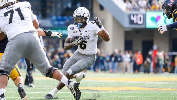 Nov 8, 2025; Morgantown, West Virginia, USA; Colorado Buffaloes wide receiver Dre'Lon Miller (6) runs the ball during the second quarter against the West Virginia Mountaineers at Milan Puskar Stadium. Mandatory Credit: Ben Queen-Imagn Images