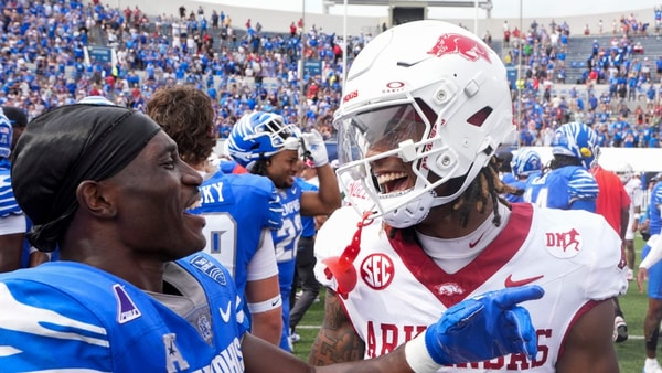 Memphis' Jamari Hawkins (9) and Arkansas' Ja'Kayden Ferguson (5)after Memphis defeated Arkansas 32-31 at Simmons Bank Liberty Stadium in Memphis, Tenn., on September 20, 2025. © Chris Day/The Commercial Appeal / USA TODAY NETWORK via Imagn Images