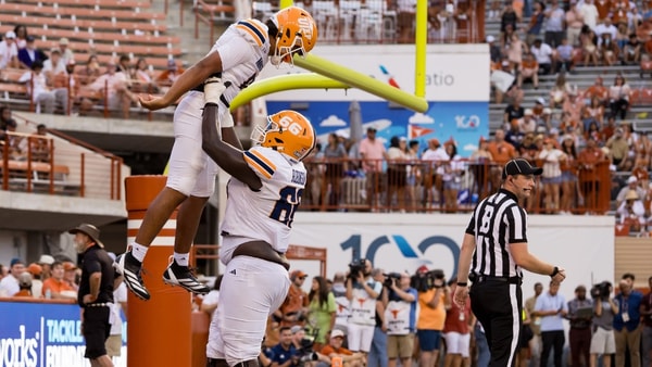 UTEP’s Mark Robinson (66) celebrates Shay Smith’s (8) touchdown during a game against Texas at Darrell K Royal–Texas Memorial Stadium in Austin, Texas, on Saturday, Sept. 13, 2025. © Gaby Velasquez / El Paso Times / USA TODAY NETWORK via Imagn Images