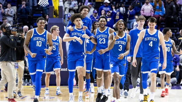 Kentucky players celebrate after beating LSU 75-74 - Chet White, UK Athletics