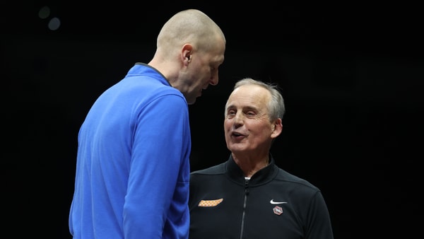 Mar 28, 2025; Indianapolis, IN, USA; Kentucky Wildcats head coach Mark Pope and Tennessee Volunteers head coach Rick Barnes talk before the game for the Midwest Regional semifinal of the 2025 NCAA tournament at Lucas Oil Stadium. Mandatory Credit: Trevor Ruszkowski-Imagn Images