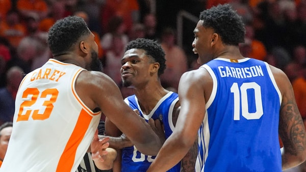 Tennessee forward Jaylen Carey (23) shoves Kentucky guard Otega Oweh (00) after a NCAA basketball game between the Tennessee Volunteers and Kentucky Wildcats at Thompson-Boling Arena at Food City Center in Knoxville, Tenn., on Jan. 17, 2026.