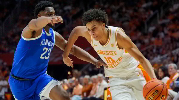 Tennessee forward Nate Ament (10) dribbles past Kentucky forward Mouhamed Dioubate (23) during a NCAA basketball game between the Tennessee Volunteers and Kentucky Wildcats at Thompson-Boling Arena at Food City Center in Knoxville, Tenn., on Jan. 17, 2026.