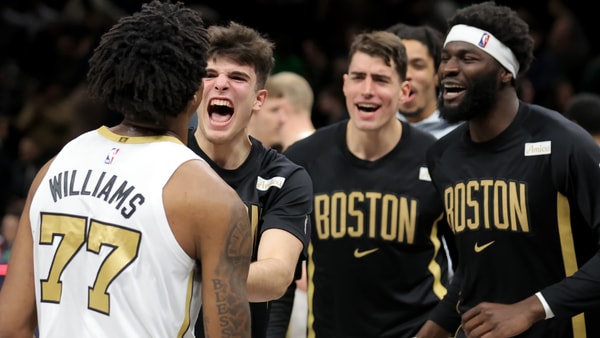 Jan 23, 2026; Brooklyn, New York, USA; Boston Celtics forward Amari Williams (77) celebrates with teammates after defeating the Brooklyn Nets in double overtime at Barclays Center. Mandatory Credit: Brad Penner-Imagn Images