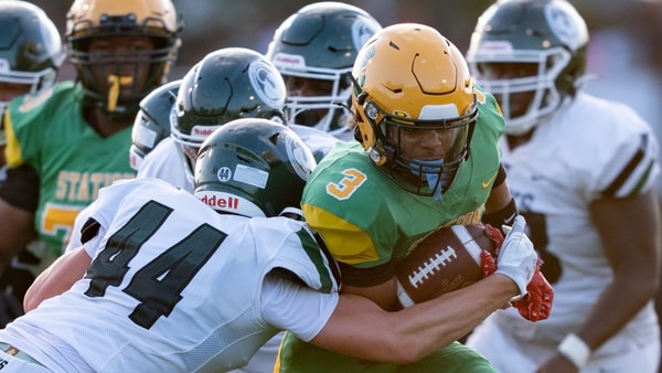 Trinity's Nick Lococo (44) tackles Bryan Station's Jordan Haskins (3) during their game on Friday, Aug. 23, 2024 at Bryan Station High School in Lexington, Ky. © Clare Grant/Courier Journal / USA TODAY NETWORK