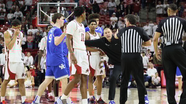Jan 31, 2026; Fayetteville, Arkansas, USA; Kentucky Wildcats head coach Mark Pope separates players during the second half against the Arkansas Razorbacks at Bud Walton Arena. Kentucky won 85-77. Mandatory Credit: Nelson Chenault-Imagn Images