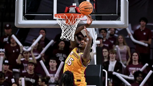 Missouri forward Shawn Phillips attacks the rim in an SEC win over Texas A&M, Maria Lysaker-Imagn Images