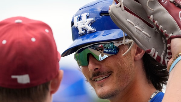 May 20, 2025; Hoover, AL, USA; Oklahoma player Sam Christiansen is reflected in the sunglasses of Kentucky first base coach Jaxon Jelkin in the first round of the SEC Baseball Tournament at the Hoover Met. (© Gary Cosby Jr. / USA TODAY NETWORK via Imagn Images)